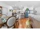 Open floor plan that shows the dining room and the living room with a view of the kitchen and bar seating at 233 Durrance St, Punta Gorda, FL 33950