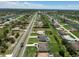 Panoramic aerial view showcases property's location in a vibrant, canal-lined community at 260 Rotonda E Blvd, Rotonda West, FL 33947