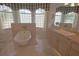 Charming bathroom with clawfoot tub, large windows providing natural light, and a classic design at 260 Rotonda E Blvd, Rotonda West, FL 33947