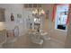Eat in kitchen with a chandelier and a view of the outdoor area at 260 Rotonda E Blvd, Rotonda West, FL 33947