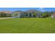 Well-manicured lawn and tropical landscaping enhance this beautiful single-story home in a sunny location at 260 Rotonda E Blvd, Rotonda West, FL 33947