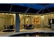 Outdoor patio featuring comfortable seating, ceiling fans, and access to the pool area for relaxation and entertaining at 260 Rotonda E Blvd, Rotonda West, FL 33947