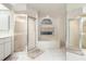 Well-lit bathroom with a tub, shower, and neutral design at 26090 Rampart Blvd, Punta Gorda, FL 33983