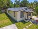 An aerial view of the house showing landscaping at 2626 E 38Th Ave, Tampa, FL 33610