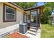 Exterior view of a home's back porch and exterior AC unit at 2626 E 38Th Ave, Tampa, FL 33610