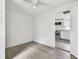 A bedroom with a closet has new floors and fresh paint at 2626 E 38Th Ave, Tampa, FL 33610
