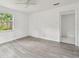 Bedroom with bright natural light, and neutral gray flooring at 2626 E 38Th Ave, Tampa, FL 33610