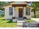 Charming front exterior of the house with tiled front porch at 2626 E 38Th Ave, Tampa, FL 33610
