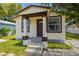 Charming single-Gathering home with a cozy front porch and well-maintained lawn at 2626 E 38Th Ave, Tampa, FL 33610