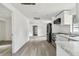 Bright, renovated kitchen with stainless steel appliances in an open layout at 2626 E 38Th Ave, Tampa, FL 33610