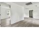 Spacious living room with new floors and fresh paint at 2626 E 38Th Ave, Tampa, FL 33610
