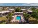 A high angle, sunny view of the community and pool surrounded by houses at 311 Garvin St # 301B, Punta Gorda, FL 33950