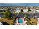 Community aerial showcasing a pool, boat docks, and condos along the waterfront, offering resort-style living at 311 Garvin St # 301B, Punta Gorda, FL 33950