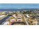 Community aerial view showcasing waterfront access, boat docks, lush landscaping and convenient parking at 311 Garvin St # 301B, Punta Gorda, FL 33950