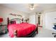 Comfortable bedroom with a ceiling fan, closet, and carpet flooring at 311 Garvin St # 301B, Punta Gorda, FL 33950