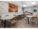 Well-lit community room featuring tables, chairs, festive decor, and tile flooring, ideal for gatherings and events at 311 Garvin St # 301B, Punta Gorda, FL 33950