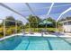 Relax near your pool with shade, seating and privacy at 3270 Ithaca St, Port Charlotte, FL 33952