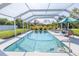 Enclosed pool with outdoor seating perfect for enjoying hot summer days at 3270 Ithaca St, Port Charlotte, FL 33952