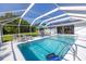 An enclosed pool provides outdoor fun and relaxation at 3270 Ithaca St, Port Charlotte, FL 33952