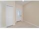 Entryway with white door and closet at 339 Canora Dr, Port Charlotte, FL 33954