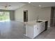 Bright, open kitchen area with a breakfast bar and modern finishes, and stainless appliances at 3532 Richardson St, North Port, FL 34288
