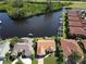 Stunning aerial view of waterfront homes with boat docks along a canal at 3588 Tripoli Blvd, Punta Gorda, FL 33950