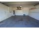 Spacious garage with built-in storage cabinets and clean epoxy flooring at 3588 Tripoli Blvd, Punta Gorda, FL 33950