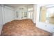 Sunroom with tile floor, multiple windows and doors providing natural light at 3588 Tripoli Blvd, Punta Gorda, FL 33950