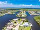 Beautiful waterfront home on a canal with lush landscaping, and stunning water views at 4142 Reif Ct, Port Charlotte, FL 33981