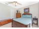 Comfortable bedroom featuring a ceiling fan and neutral decor at 4142 Reif Ct, Port Charlotte, FL 33981