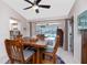 Bright dining area with water views and access to the pool area at 4142 Reif Ct, Port Charlotte, FL 33981