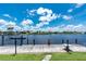 A private dock with boat lift offers direct access to the serene waterway at 4142 Reif Ct, Port Charlotte, FL 33981