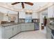 Spacious kitchen with granite countertops and a view to the outside at 4142 Reif Ct, Port Charlotte, FL 33981