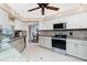 Bright kitchen with stainless steel appliances and a view of the dining area at 4142 Reif Ct, Port Charlotte, FL 33981