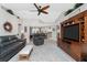 Bright and open floor plan with kitchen view, vaulted ceiling, and lots of comfortable seating at 4142 Reif Ct, Port Charlotte, FL 33981