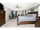Large main bedroom with water views, plush carpet, and dark wood furnishings at 4142 Reif Ct, Port Charlotte, FL 33981