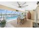 Screened-in lanai features pool overlooking the canal, perfect for outdoor dining and entertaining at 4142 Reif Ct, Port Charlotte, FL 33981