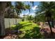 Well-manicured backyard with a lush lawn and plenty of space for outdoor activities and relaxation at 4640 W Price Blvd, North Port, FL 34286