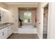 Relaxing bathroom showcasing a soaking tub, granite countertop, and tiled shower at 4640 W Price Blvd, North Port, FL 34286
