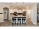 Bright kitchen with an island bar, granite countertops, stainless appliances, and pendant lighting at 4640 W Price Blvd, North Port, FL 34286
