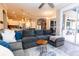 Spacious living area showcasing an open floor plan connecting the kitchen to the cozy living area at 4640 W Price Blvd, North Port, FL 34286