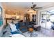 Open concept kitchen and living space with access to the outdoor patio area with a pool at 4640 W Price Blvd, North Port, FL 34286