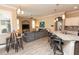 Open floorplan showcasing a living space with kitchen island and bar stool seating at 4640 W Price Blvd, North Port, FL 34286