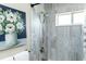 Shower stall featuring updated tile surround and shower head at 4640 W Price Blvd, North Port, FL 34286
