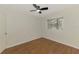 Well-lit bedroom with natural light, hardwood floors, and a modern ceiling fan at 510 Border St, Port Charlotte, FL 33953