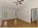 Primary bedroom features hard wood floors and natural light at 510 Border St, Port Charlotte, FL 33953