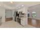 Open kitchen features stainless appliances and adjacent living area at 510 Border St, Port Charlotte, FL 33953
