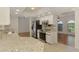 Well-lit kitchen with granite countertops, modern appliances, and ample cabinet space at 510 Border St, Port Charlotte, FL 33953