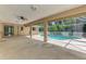 Spacious screened lanai with an inviting in-ground pool, perfect for relaxation and entertaining at 510 Border St, Port Charlotte, FL 33953