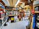 Garage interior featuring an abundance of storage with shelving and an open floor at 6562 Hikina Dr, North Port, FL 34287
